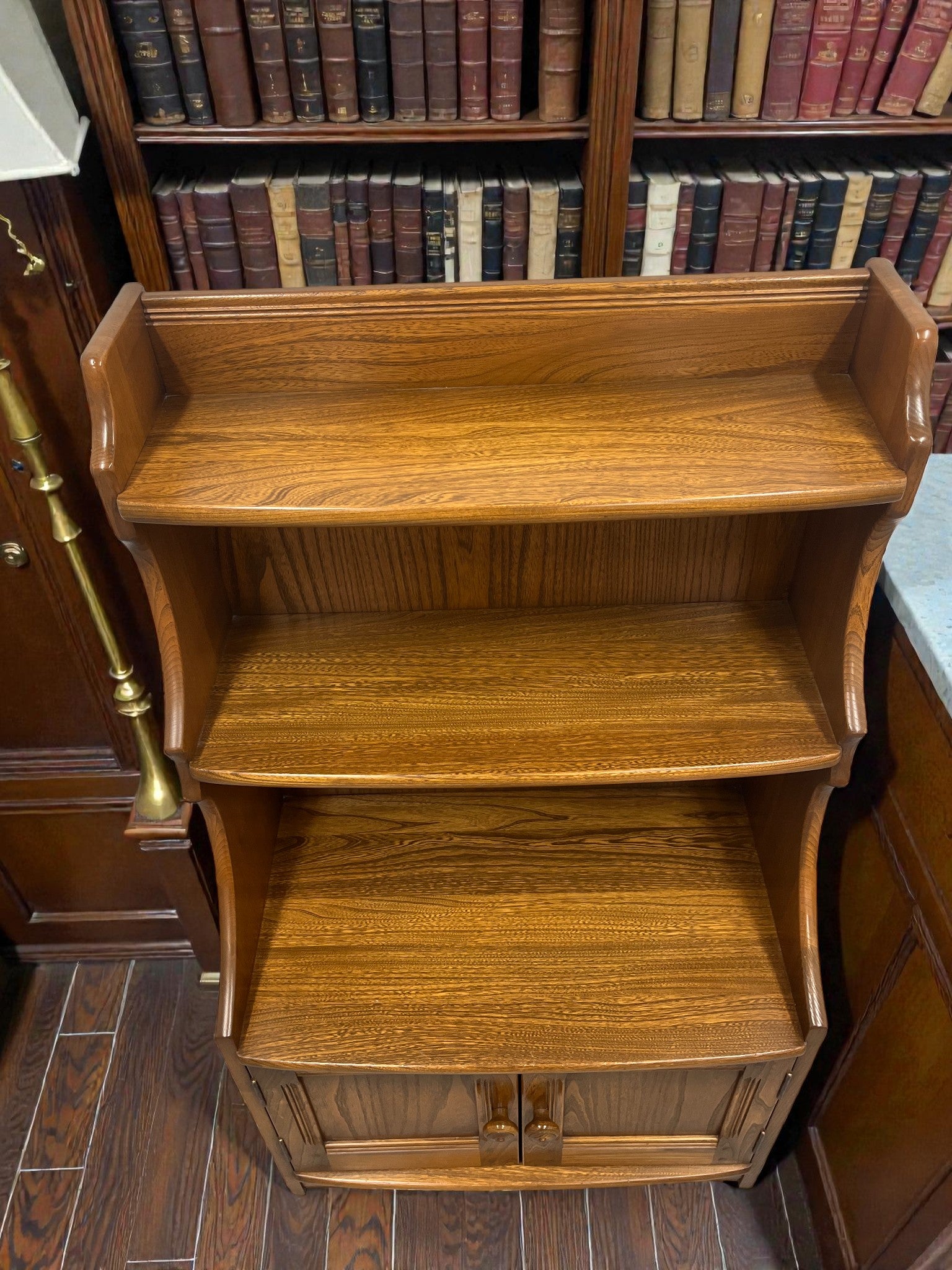 Ercol Golden Dawn Waterfall Bookcase with Cupboard | Mid-Century Elm