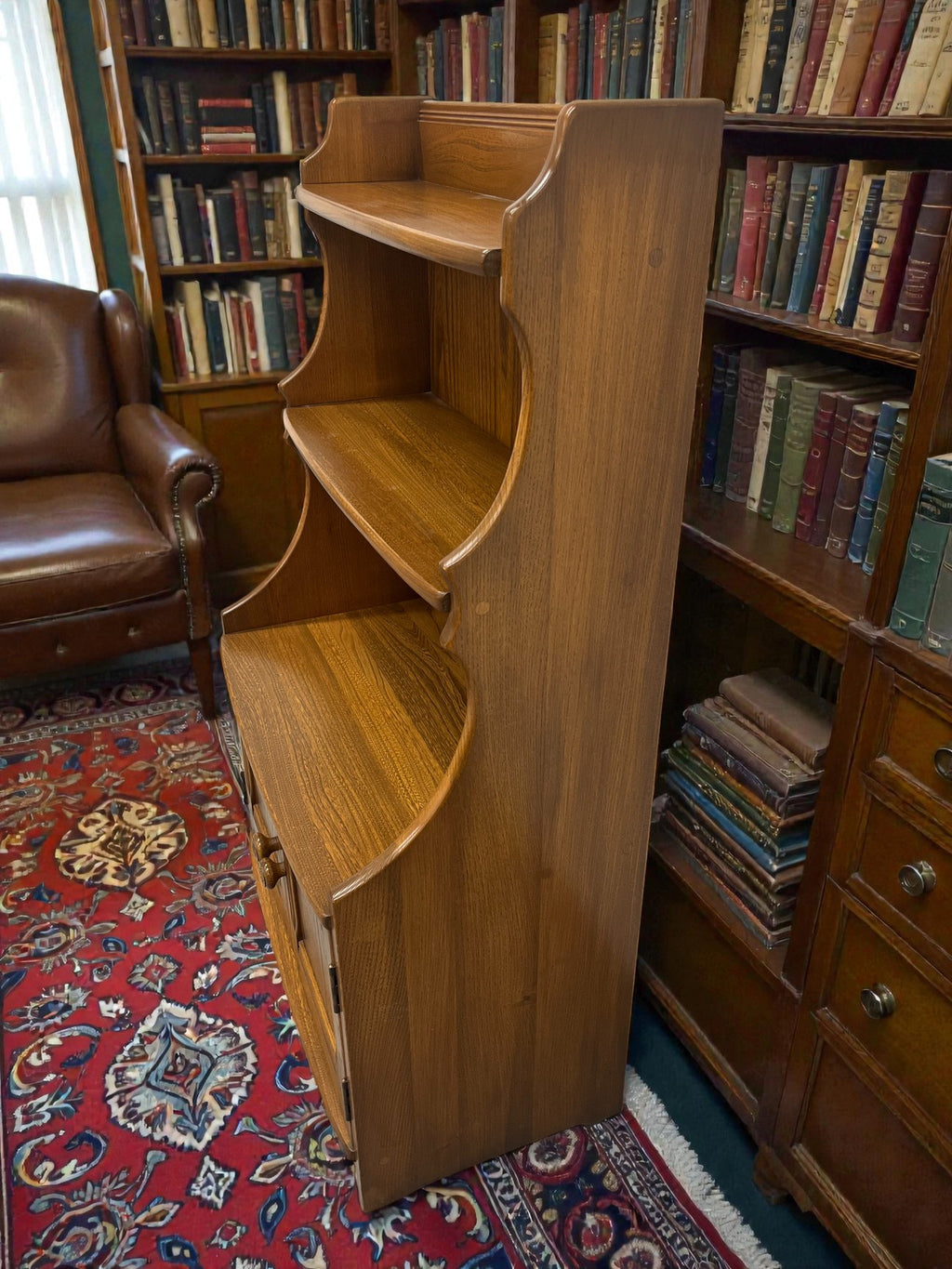 Ercol Golden Dawn Waterfall Bookcase with Cupboard | Mid-Century Elm