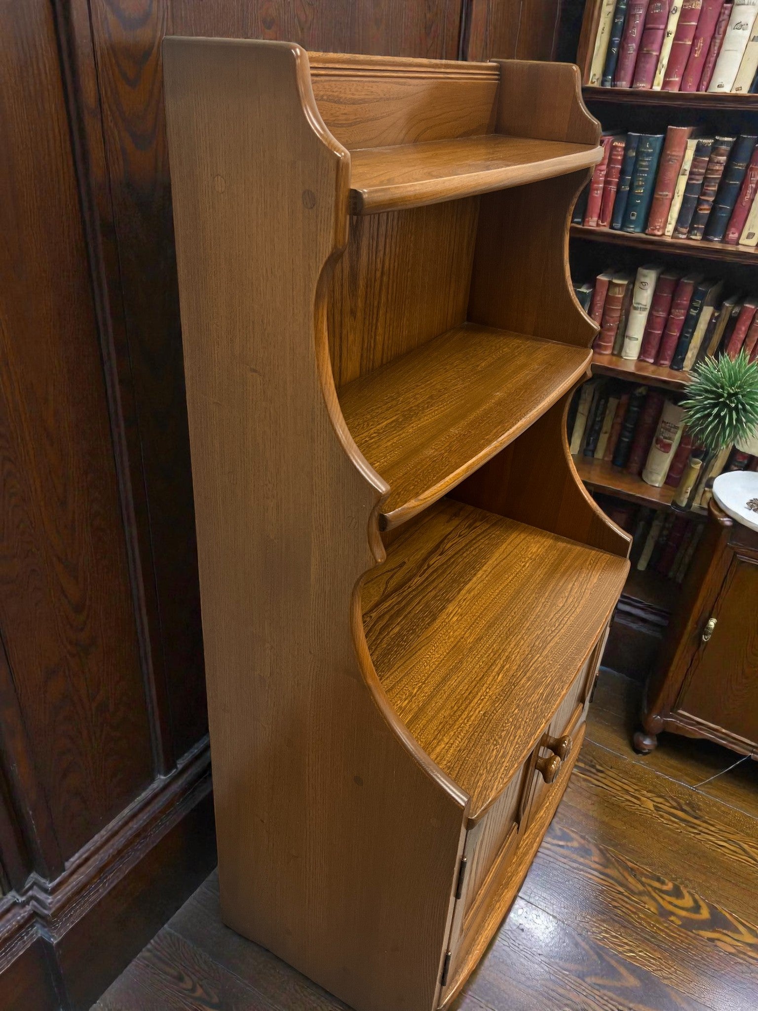 Ercol Golden Dawn Waterfall Bookcase with Cupboard | Mid-Century Elm